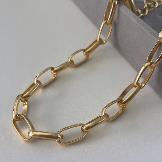 Correntaria elo oval Cartier.