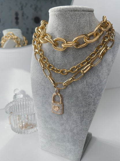 Correntaria elo oval Cartier.